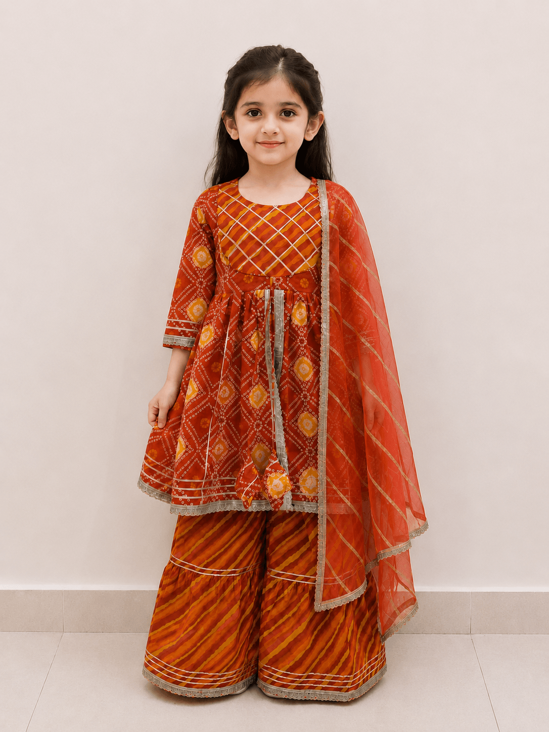 Girls Rust Orange Bandhani Print Peplum Kurti Sharara Set | Kids Gota Patti Traditional Festive Wear Suit with Dupatta
